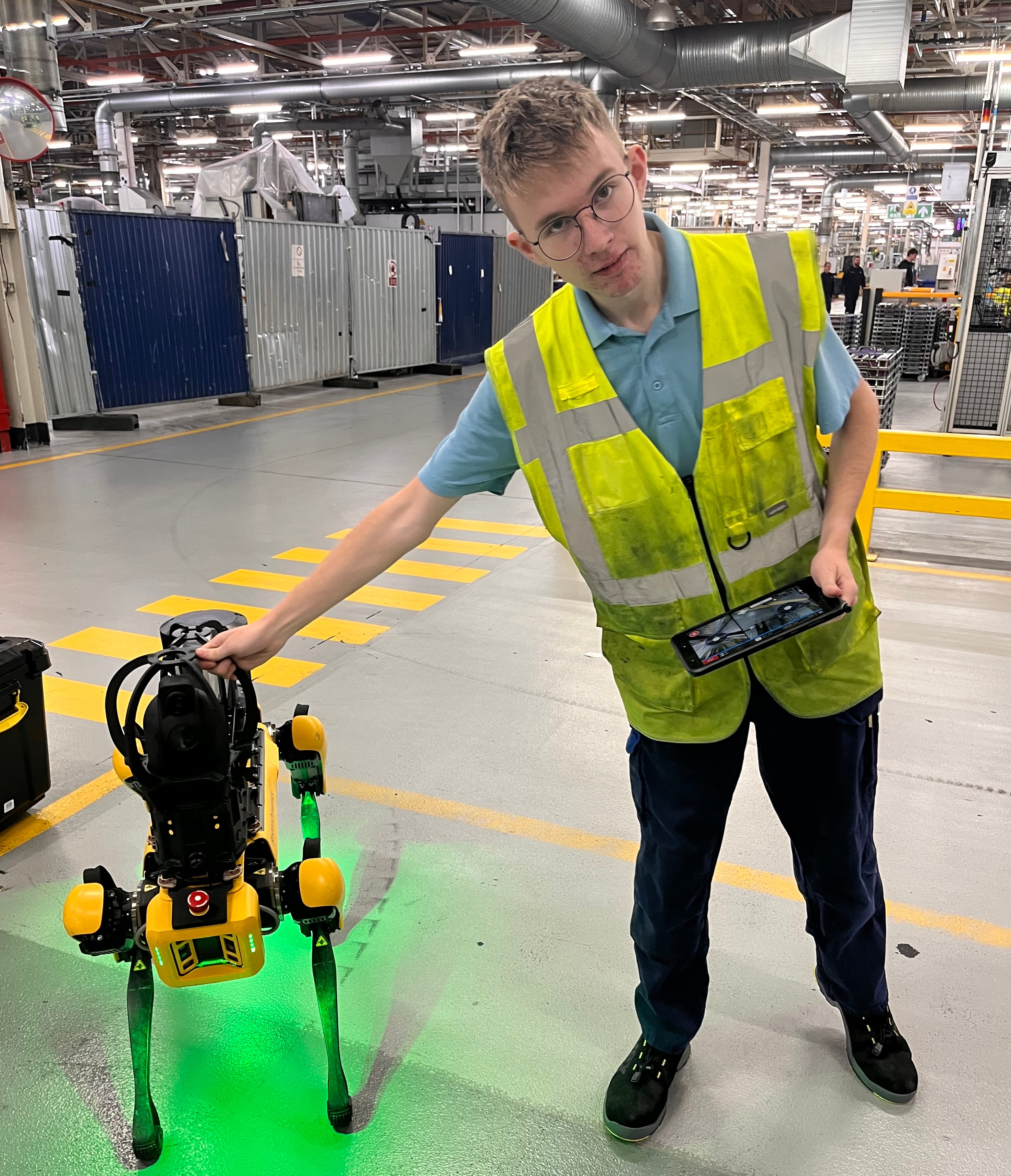 Joe with the robot dog at Halewood, UK